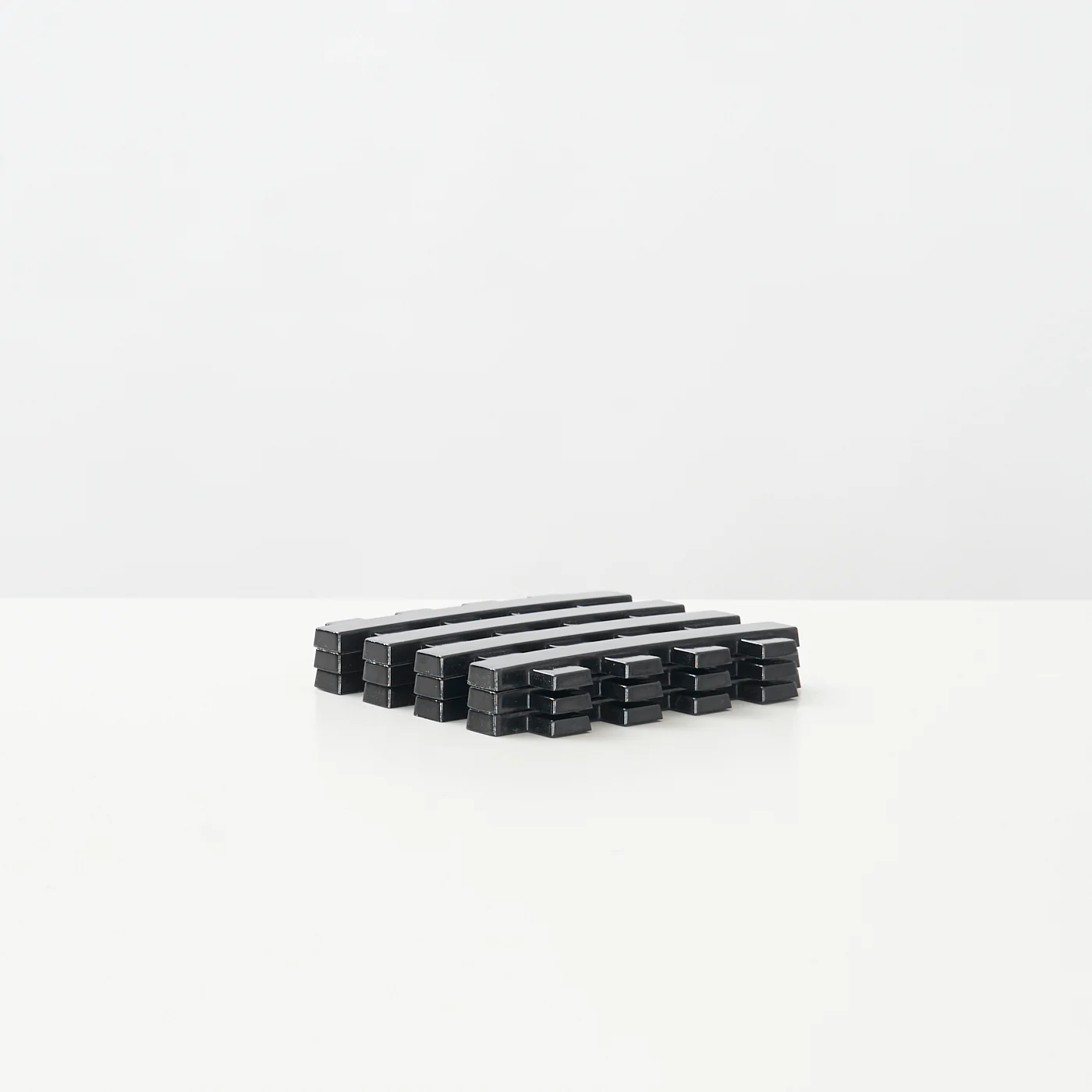 Set of 3 Cross Hatch Plastic Trivets by Copco