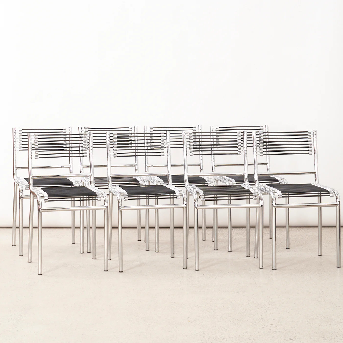 Set of 8 'Sandows' Chairs by René Herbst