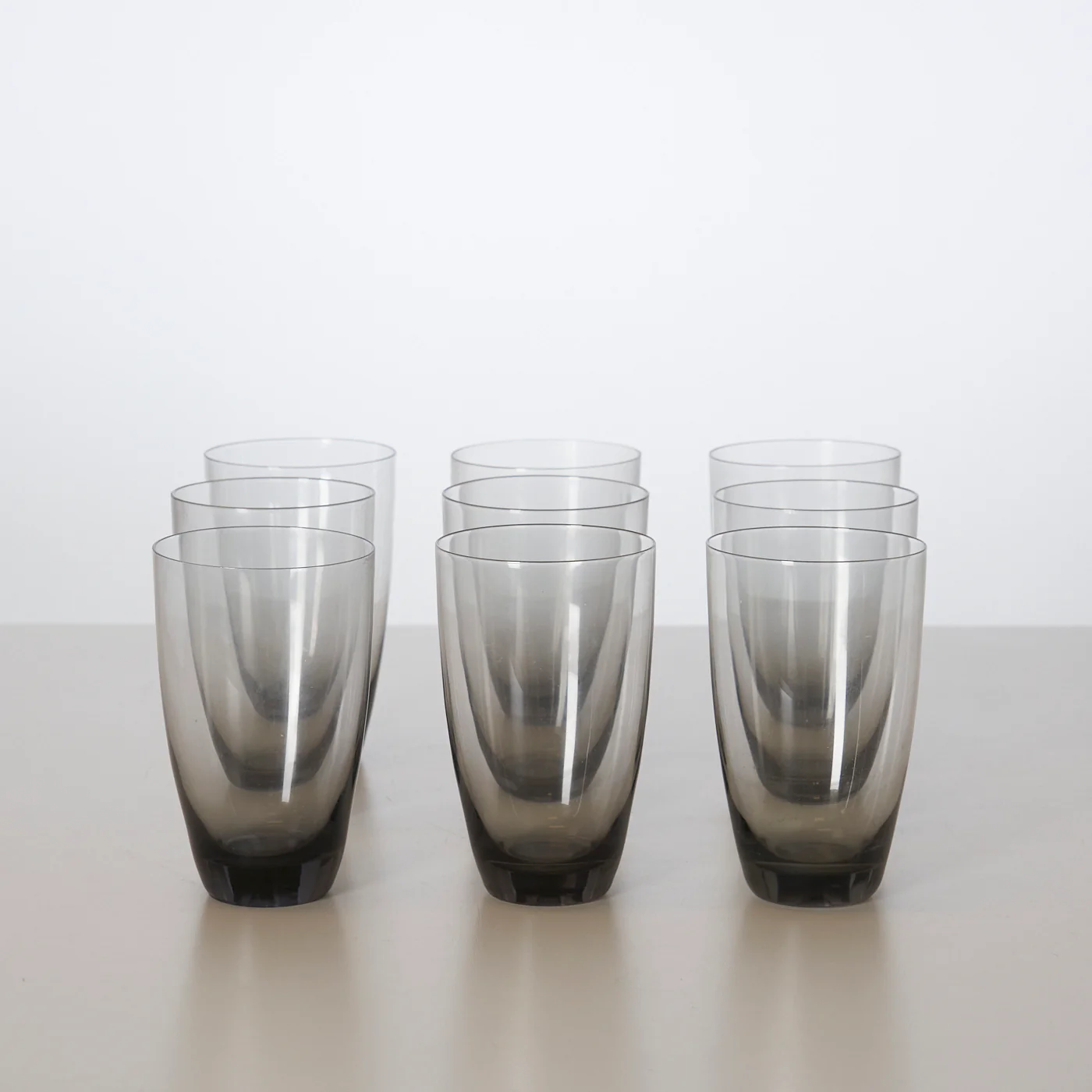 Set of 9 ‘Copenhagen’ Smoked Glass Tumblers by Per Lütken for Holmegaard, Denmark